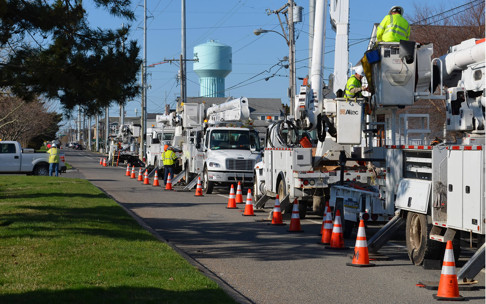 Work trucks parked in a line